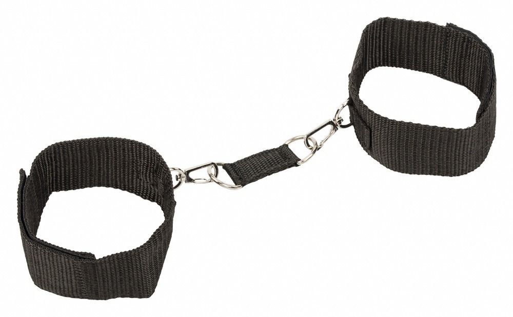 Поножи Bondage Collection Ankle Cuffs Plus Size выполнены на липучках, а потому подходят даже для самых пышных ножек. Ширина оков - 5 см., длина оков - 39 см.<br> Длина карабинов - 14 см.