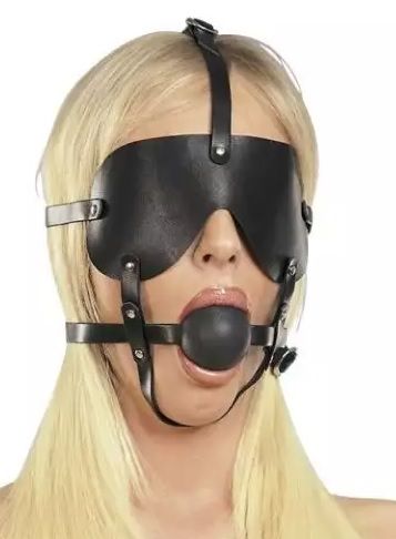Представленная бондажная  маска-сбруя оснащена кляпом и шорами. Ремни позволяют регулировать размер и надежно фиксируют подбородок. Все ее детали тщательно продуманы и выполнены вручную.   Диаметр кляпа - 5,4 см.