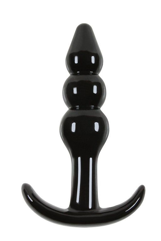 Анальная пробка Jelly Rancher T-Plug - Ripple - Black черного цвета . Податливый материал легко принимает изгибы вашего тела, а широкое основание-присоска служит безопасным ограничителем и в тоже время прекрасно крепится к гладким плоским поверхностям. Рельефная форма,плавные изгибы  обеспечивают дополнительную, чувственную стимуляцию.