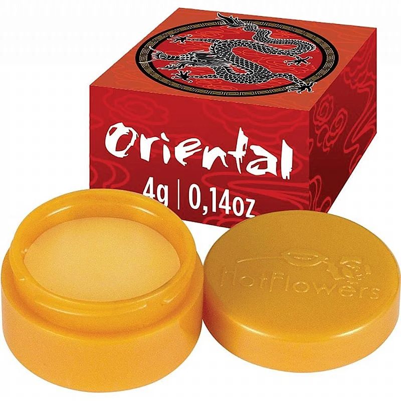 Крем Oriental с охлаждающе-разогревающим эффектом для наружного применения, вызывающий ощущения то холода, то тепла, в упаковке для однократного применения.