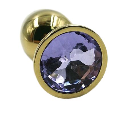 Золотая анальная пробка из алюминия размер S. Страз в основании круглой формы,  выполнен из стекла светло-фиолетового цвета. Упакована в вельветовый мешочек для хранения. Вес - 52 гр.
