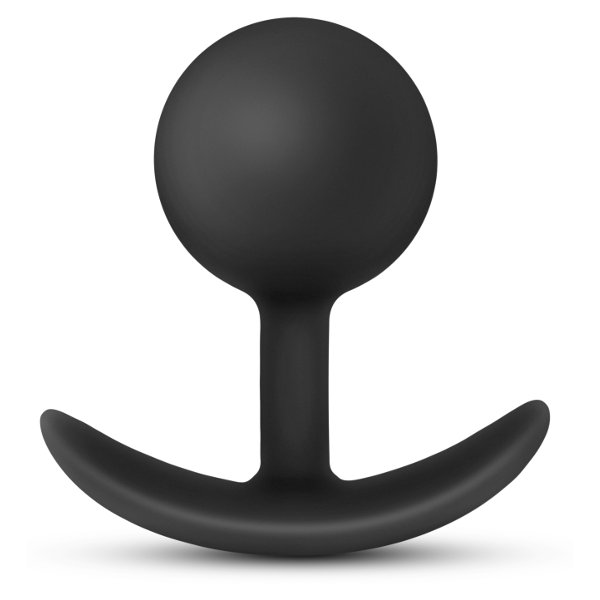 Черная анальная пробка Silicone Vibra Plug. Выполнена в форме шарика на шейке, со смещенным центром тяжести. Рабочая длина - 7,6 см.