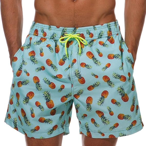 Голубые пляжные шорты с ананасами. Отлично подходят для пляжного отдыха и плавания. С сеткой внутри. Быстросохнущая ткань.