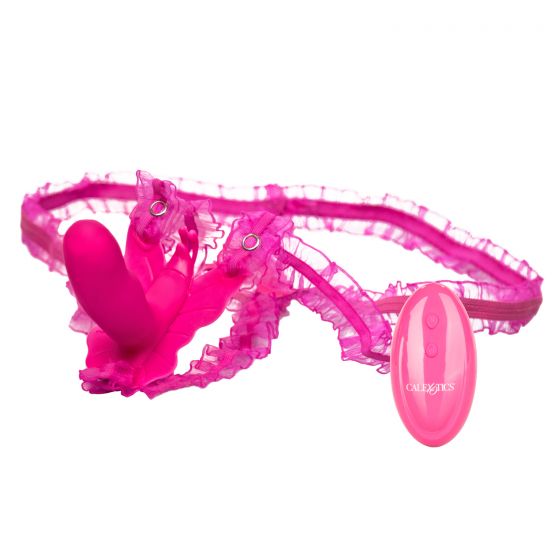Розовая вибробабочка на ремешках Silicone Remote Venus Penis. Ремешки отстегиваются. Бабочка имеет хоботок для вагинальной стимуляции и вибрирует в 12 режимах, управлять которыми можно при помощи пульта ДУ. Рабочая длина - 8,25 см., диаметр - 3,25 см.