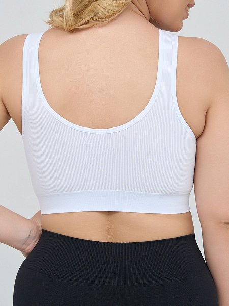Бюстгальтер-топ в мелкий рубчик, со скрытым (внутренним) подкроем для комфортного удержания груди, широкие бретели, формованные вставки вынимаются, очень комфортный, микрофибра, V-образный вырез делает фигуру зрительно стройнее.