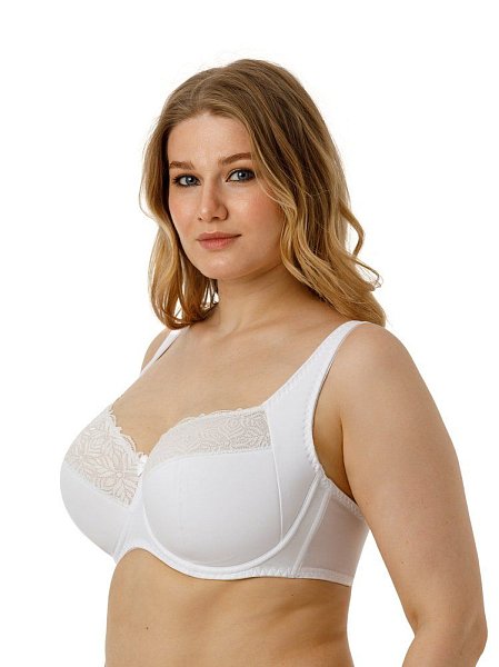 Бюстгальтер на каркасах с полудублированной чашкой. Чашки овальной формы с диагональным членением и боковым подрезом создают округлую наполненную форму и обеспечивают надёжную, высокую и комфортную поддержку груди. Усиленная бретель снимает нагрузку с плечевого пояса. Широкий стан с боковыми упругими пластинами плотно облегает тело и обеспечивает стабильную комфортную посадку бюстгальтера на фигуре.