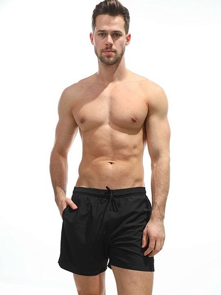 Мужские пляжные шорты из быстросохнущей ткани. Пояс на резинке, регулируется витым шнурком.