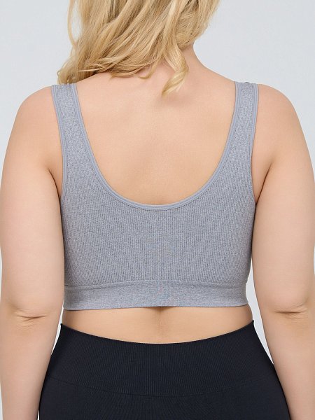 Бюстгальтер-топ в мелкий рубчик, со скрытым (внутренним) подкроем для комфортного удержания груди, широкие бретели, формованные вставки вынимаются, очень комфортный, микрофибра, V-образный вырез делает фигуру зрительно стройнее.