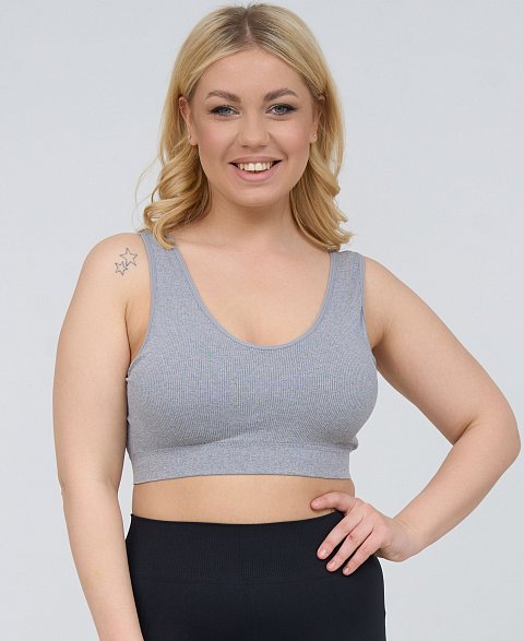 Бюстгальтер-топ в мелкий рубчик, со скрытым (внутренним) подкроем для комфортного удержания груди, широкие бретели, формованные вставки вынимаются, очень комфортный, микрофибра, V-образный вырез делает фигуру зрительно стройнее.