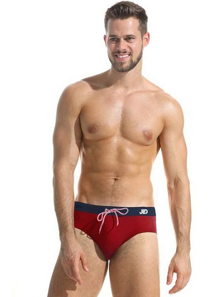 Мужские пляжные плавки. Пояс регулируется плетеным шнурком.