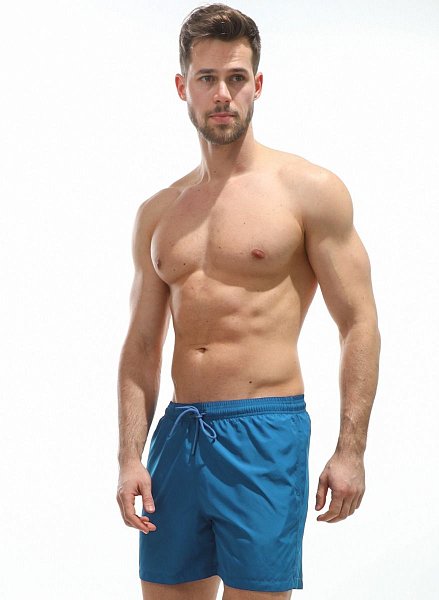 Мужские пляжные шорты из быстросохнущей ткани. Пояс на резинке, регулируется витым шнурком.