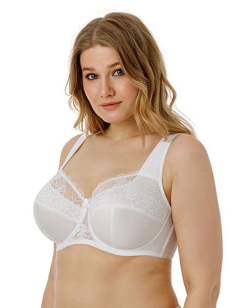 Бюстгальтер на каркасах с мягкой чашкой. Чашки имеют Т-образное членение, что позволяет придать груди правильную округлую форму. Широкий стан с боковыми упругими пластинами плотно облегает тело и обеспечивает стабильную комфортную посадку бюстгальтера на фигуре.