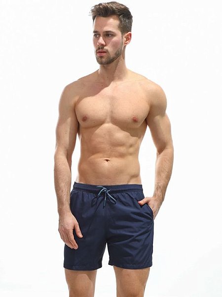 Мужские пляжные шорты из быстросохнущей ткани. Пояс на резинке, регулируется витым шнурком.